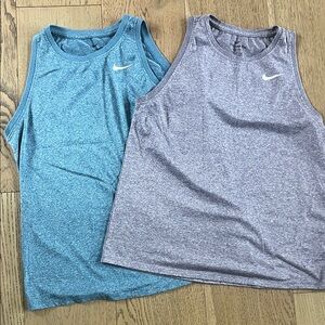 Two Nike Dri-FIT Tank Tops in Teal and Lavender. Women’s medium.